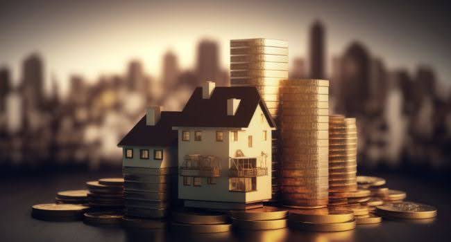 Coin Stack Supporting 3D House Illustrating High-Return Focused Investments in Real Estate Syndications